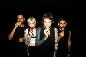 Laura Jane Grace In The Trauma Tropes Announce New Album 'Adventure Club'