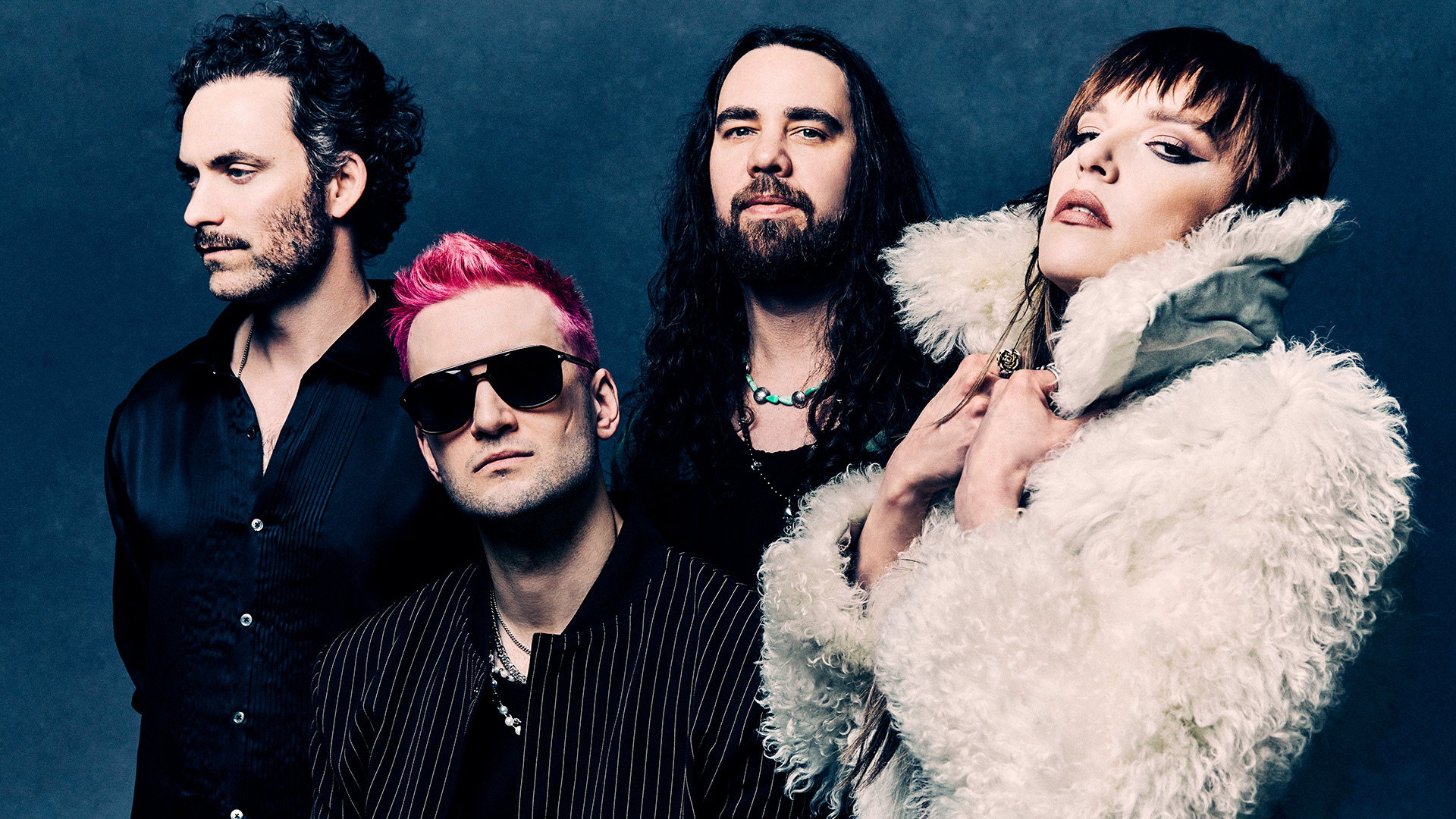 The band captures the essence of rock rebellion through dynamic poses.